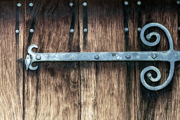 An Aged Wrought Iron Door Hinge