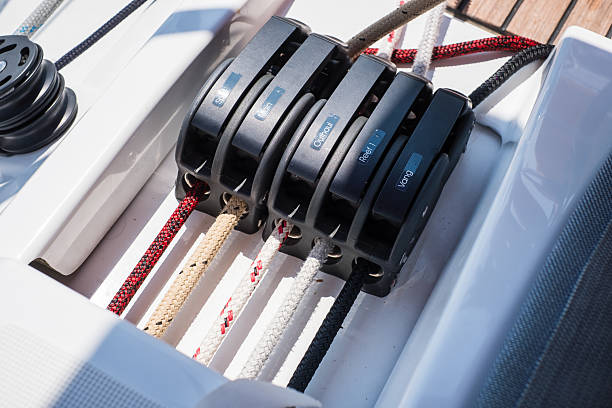 istock Sailing yacht ropes, stopper and winch. 2213481656