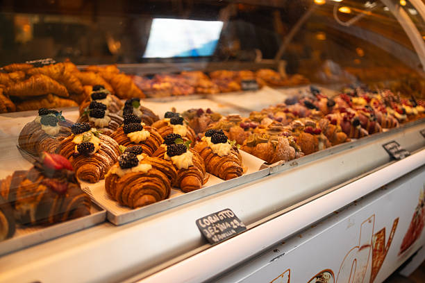 istock Display of fresh croissants and pastries in a bakery. 2213481995