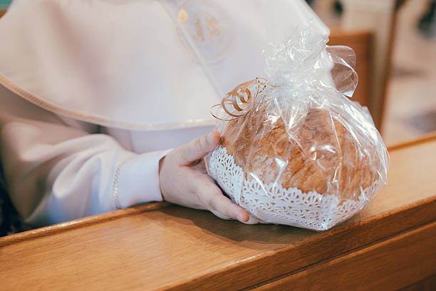 Catholic celebration during which the faithful receive the Eucharist for the first time, that is, according to the faith they profess, the true body and blood of Christ in the form of bread