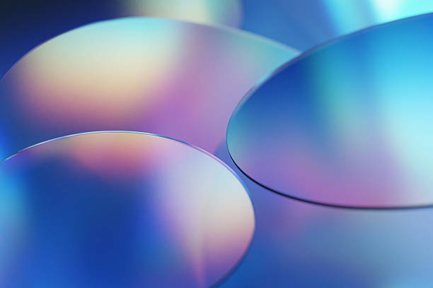 An artistic digital composition with translucent rings, glass disks and gradient blue tones, showcasing creativity and modern aesthetic balance, ideal for design, technology, and abstraction themes.