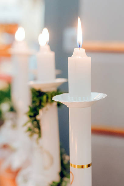 Symbolic white communion candle used during First Holy Communion, representing light, faith, and Christian tradition.