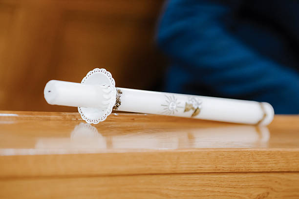 Symbolic white communion candle used during First Holy Communion, representing light, faith, and Christian tradition.