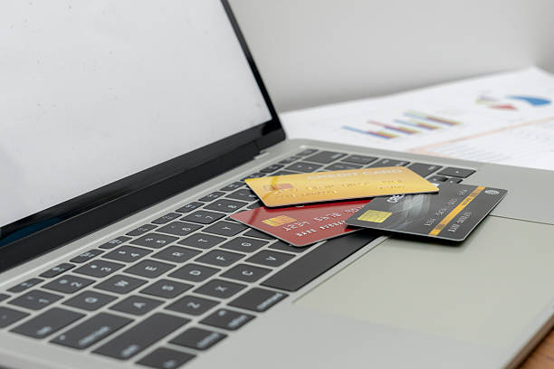 istock A visual representation of online purchasing, credit card resting on a laptop, highlighting convenience and the importance of secure payments 2213501716