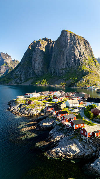 istock Breathtaking coastal village in Norway against dramatic mountainous backdrop 2213515742