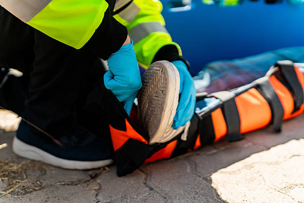 istock Paramedics helping victim outdoors 2213517602