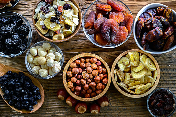 istock Composition with a variety of dried fruits and assorted nuts. 2213519754