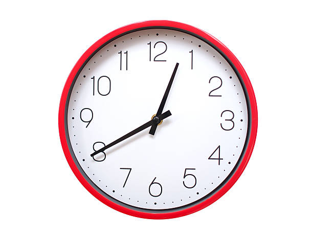 Simple wall clock with black frame and white face displaying 00:40 or 12:40. Ideal for time, schedule, and punctuality themes.