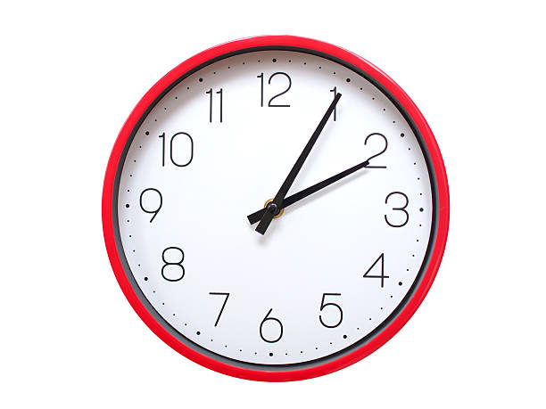 Minimalist red framed wall clock pointing at 02:05 or 14:05. Isolated on white background. Concept of time management.