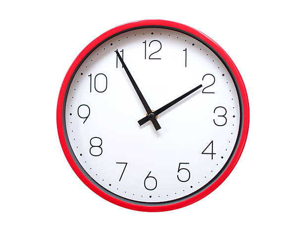 Minimalist red framed wall clock pointing at 01:55 or 13:55. Isolated on white background. Concept of time management.