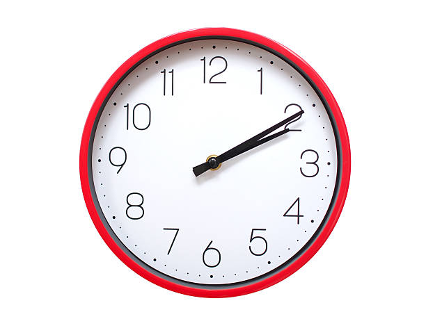 Minimalist red framed wall clock pointing at 02:10 or 14:10. Isolated on white background. Concept of time management.