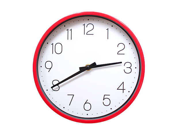 Minimalist red framed wall clock pointing at 02:40 or 14:40. Isolated on white background. Concept of time management.