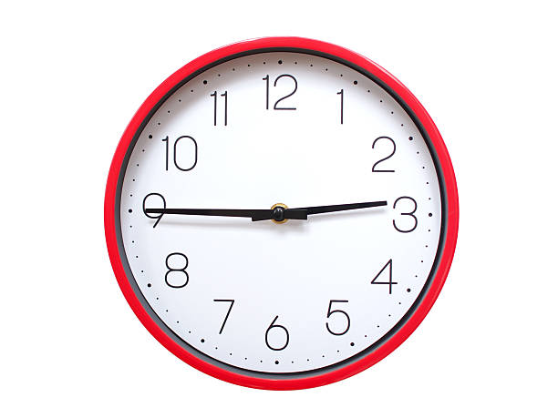 Minimalist red framed wall clock pointing at 02:45 or 14:45. Isolated on white background. Concept of time management.