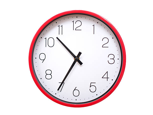 istock Minimalist red framed wall clock pointing at 10:35 or 22:35. Isolated on white background. Concept of time management. 2213521763