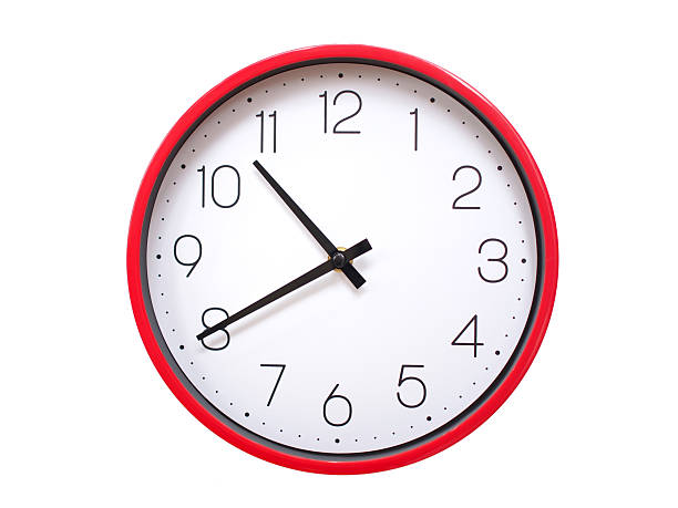 istock Minimalist red framed wall clock pointing at 10:40 or 22:40. Isolated on white background. Concept of time management. 2213521765