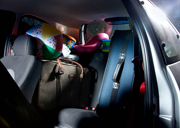 istock Car packed with bags for a road trip 2213522534