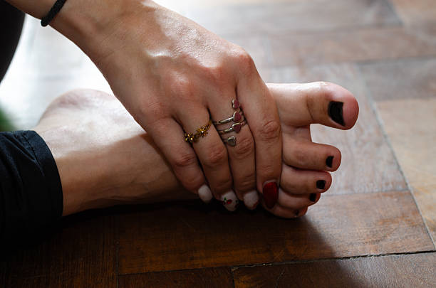 istock Woman massaging her foot after training 2213524148