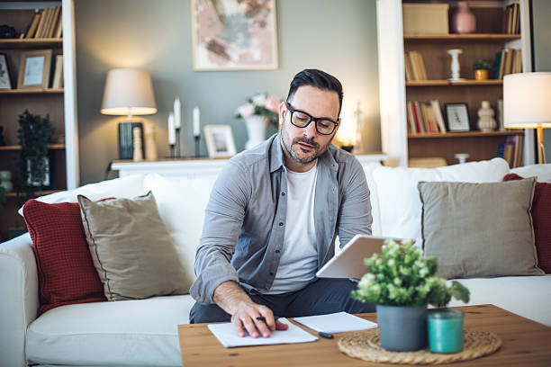 istock Mid adult man working from home office 2213528850