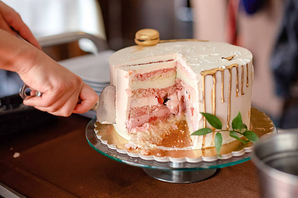 istock Large Communion Cake Served at First Holy Communion Celebration 2213529930