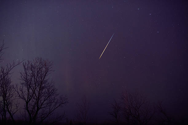 Aurora borealis, polar lights with Milky Way stars.