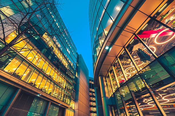 istock Modern architecture with reflective glass facades at dusk 2213534593