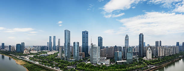 istock Stunning Panoramic View of a Modern Urban Skyline with Lush Greenery 2213536054