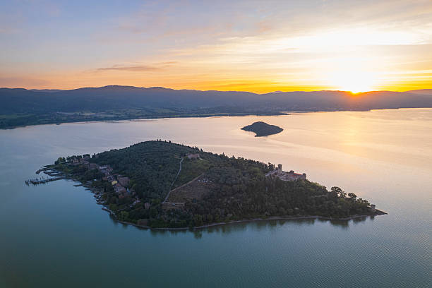 istock Trasimeno lake islands at sunrise 2213536072