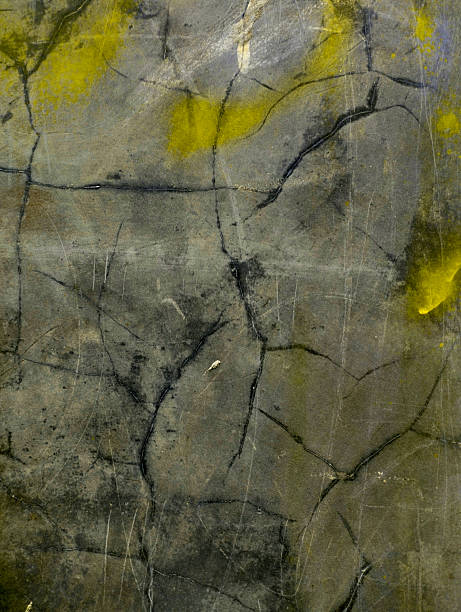 istock background of cracked and mossy concrete wall 2213544703