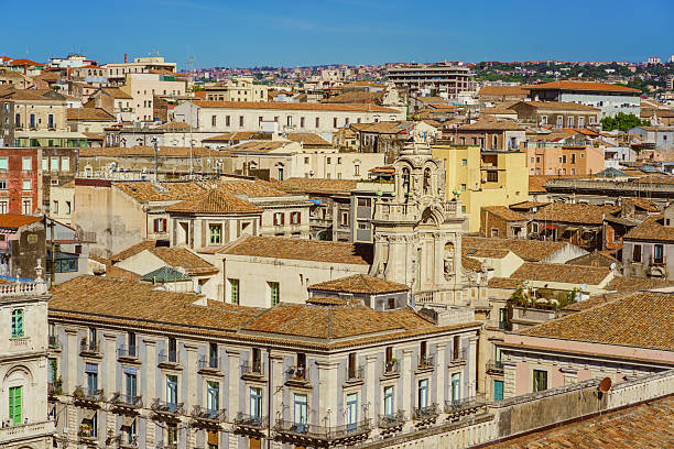 istock Sunlit Rooftops and Baroque Tower in Historic Catania 2213545732