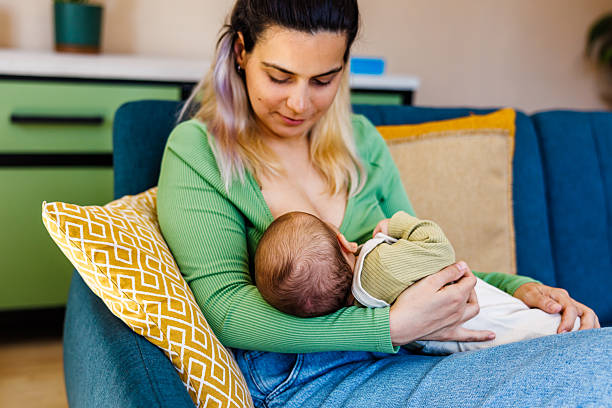 istock New Mom with Her Baby 2213546656