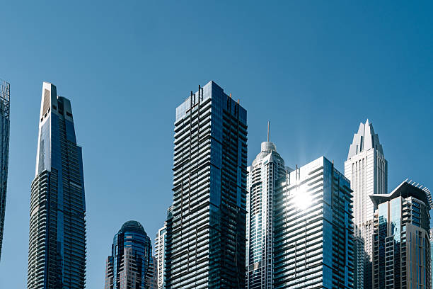 istock Dubai Marina skyscrapers rising under a clear blue sky 2213552714