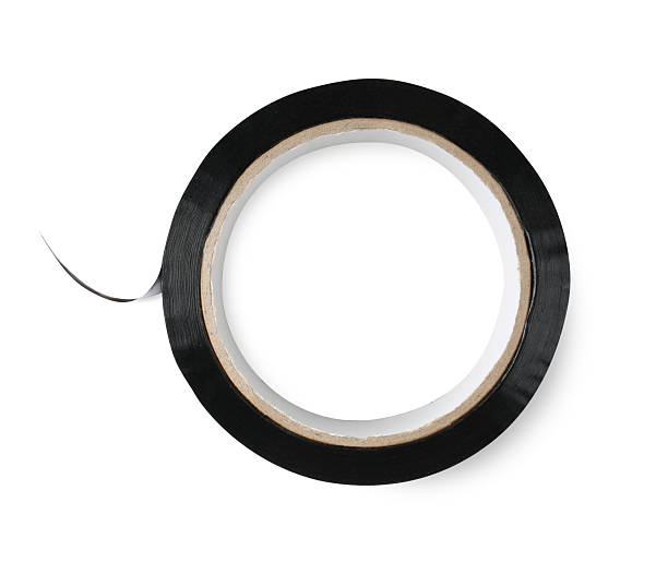 istock Roll of black adhesive tape isolated on white, top view 2213555916