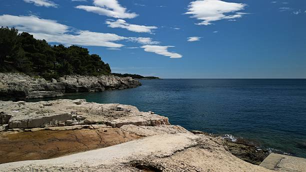 istock Scenic Coastal Landscape with Rocky Cliffs 2213557516