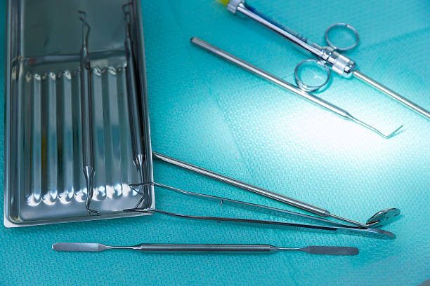 istock A Collection of Dental Tools on a Turquoise Surface Showcasing Precision Instruments Essential for Effective Oral Health Procedures and Patient Care in Dentistry 2213557656