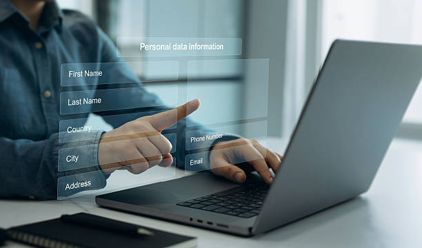 istock Business person filling out a form with personal data online. Personal data information management. Digital online employee form. Human resource concept. 2213557668