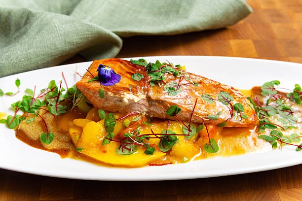 istock Seared salmon fillet with mango sauce. 2213558913