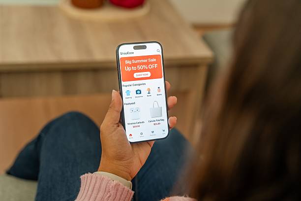 istock Woman using shopping online app on mobile phone 2213560370