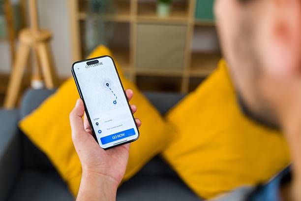 istock Young Adult Navigating with Smartphone App 2213562166