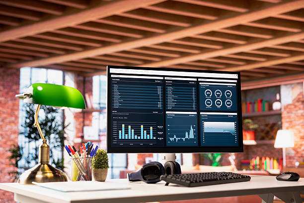 istock Financial software UI on PC screen on apartment office desk 2213562236