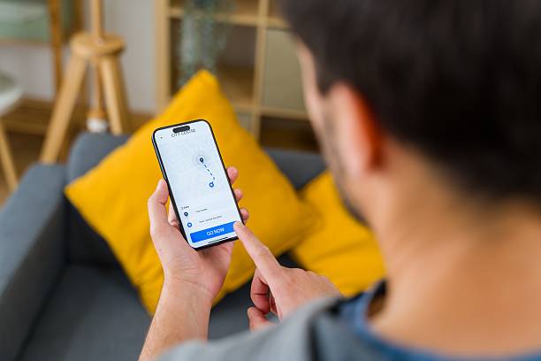 istock Navigating Urban Routes with Smartphone App 2213562239