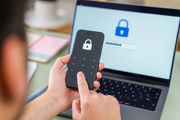 istock Ensuring Digital Security with Smartphone and Laptop 2213563523