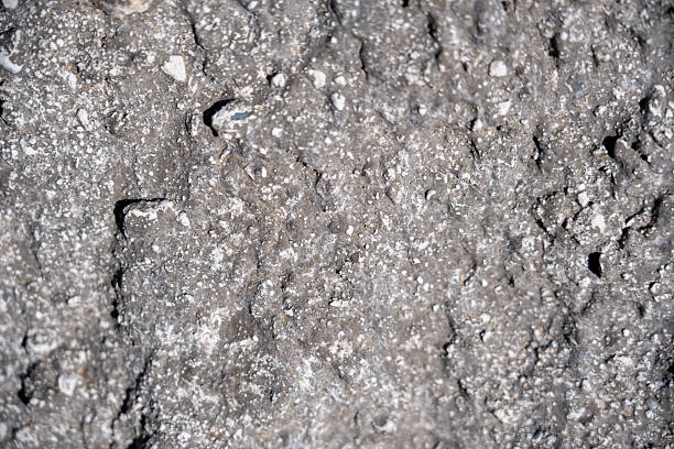 istock Abstract texture of weathered concrete layer. Background texture of concrete layer 2213564769