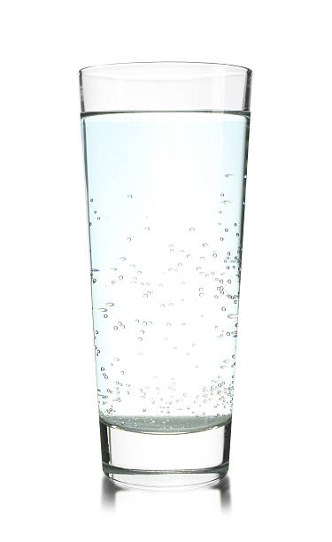 istock Refreshing soda water in glass on mirror surface isolated on white 2213567674