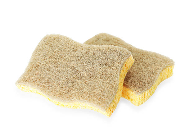 istock Two yellow sponges isolated on white. Cleaning supply 2213568064