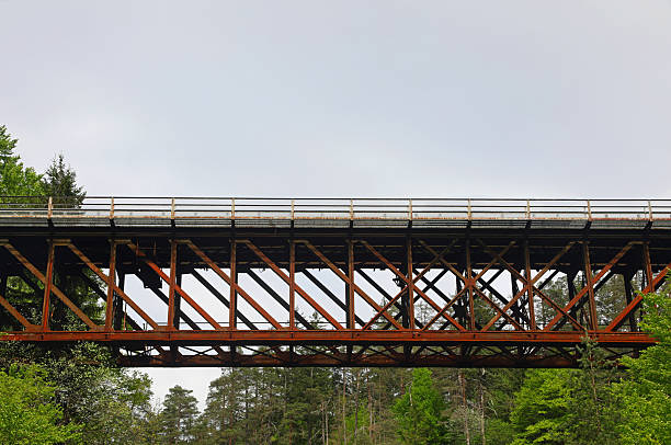 old iron bridge used a long time ago for a railway and now used as a cycle path