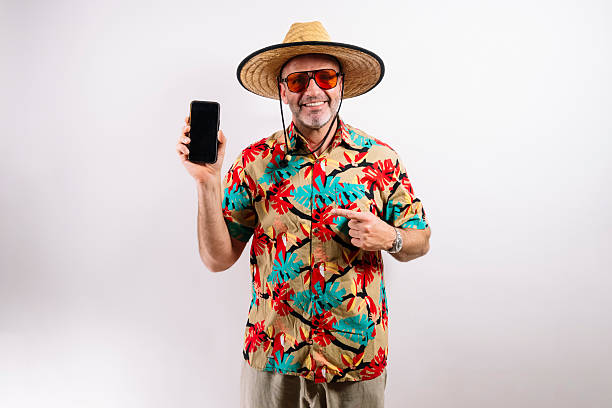 istock Mature tourist holding phone with blank screen 2213574280