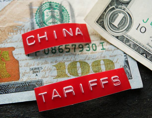 istock China Tariffs labels on a US cash 2213578785