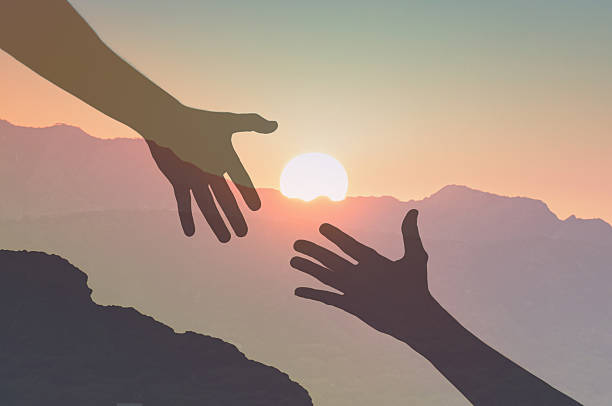 istock Helping hands. Rescue, friendship.  Hands reaching out for help. 2213584710