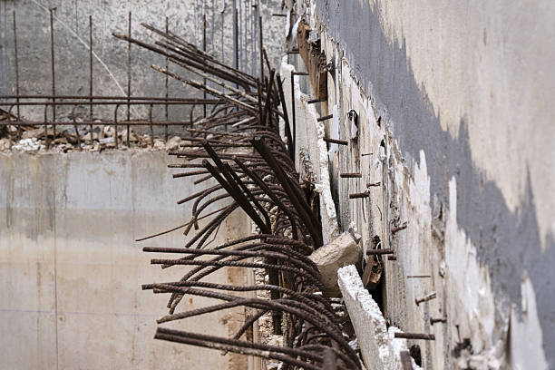 istock Exposed rebar in unfinished concrete building construction site 2213587968