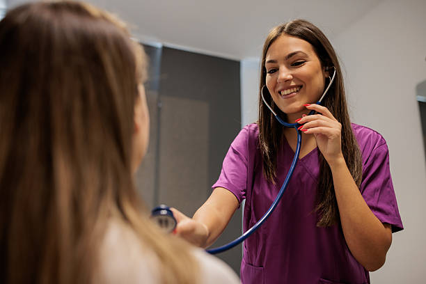 istock Doctor Preparing to Check Patient's Breathing with Stethoscope 2213587974